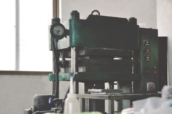 A machine on a table in a room.