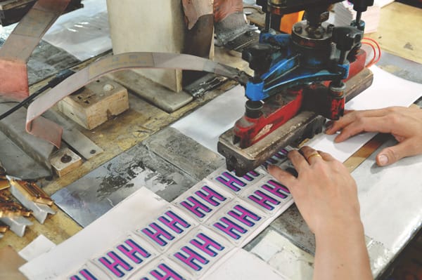 A person working on machinery.